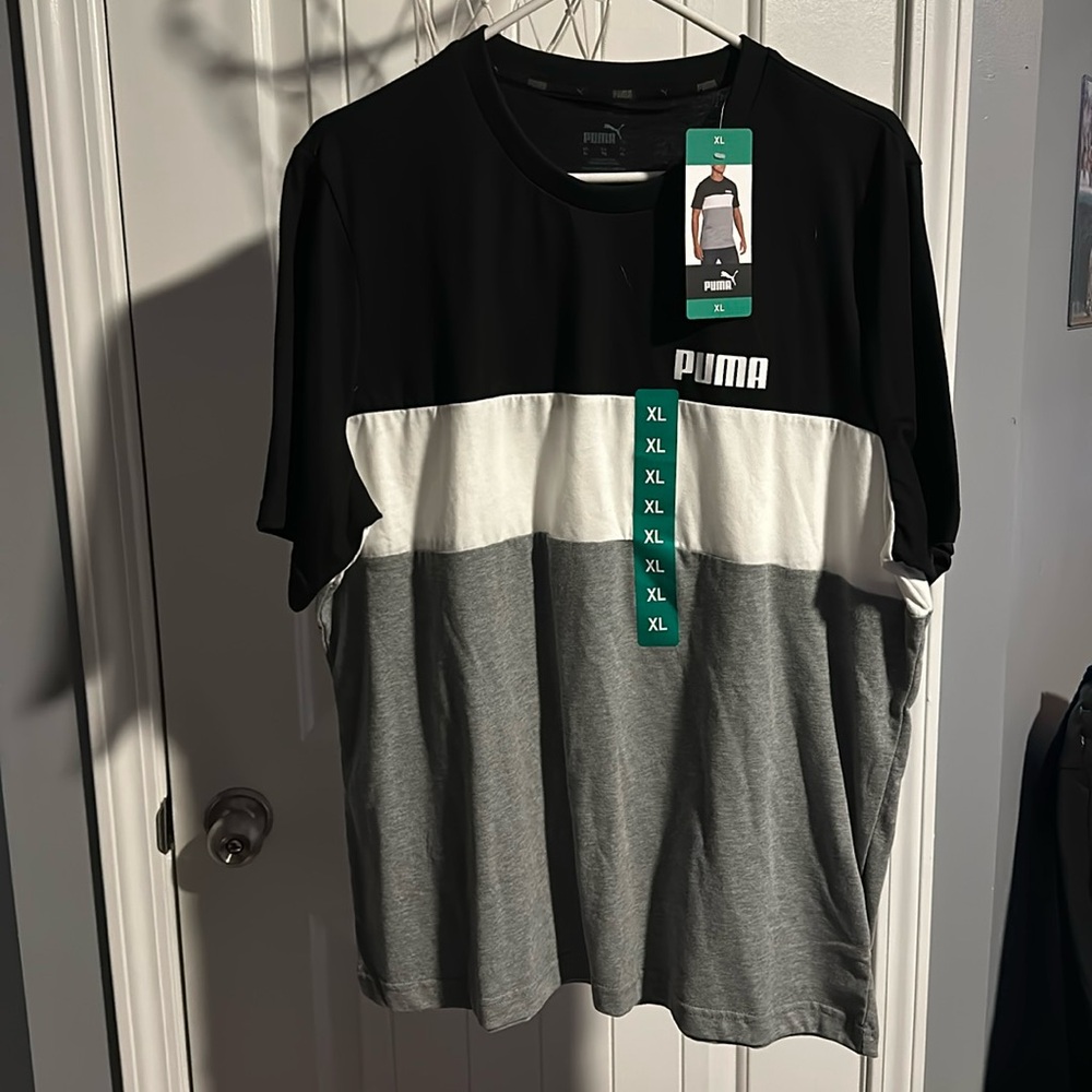 Men’s Puma shortsleeved shirt. Black, White and Grey.